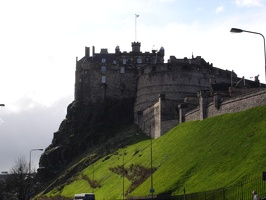 Edinburgh castle and green grass.