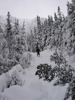 Me skiing down Sherburne Trail