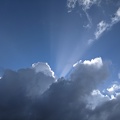 20210718_003012548_sun_behind_clouds.jpg