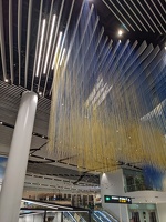 20220430 073948490 akl intl terminal sun showers artwork