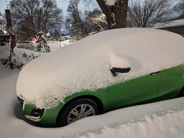 20230114 043503358 snow covered car