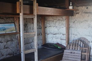 01381 inside mud hut bunks