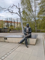 20250505 072730349 statue guy sitting