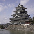 06299_matsumoto_castle_with_bird_flying_by.JPG